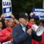 President Joe Biden addresses striking members of the United Auto Workers union at a picket line outside a General Motors Service Parts Operations plant in Belleville, Michigan, in September. Credit: Jim Watson/AFP via Getty Images