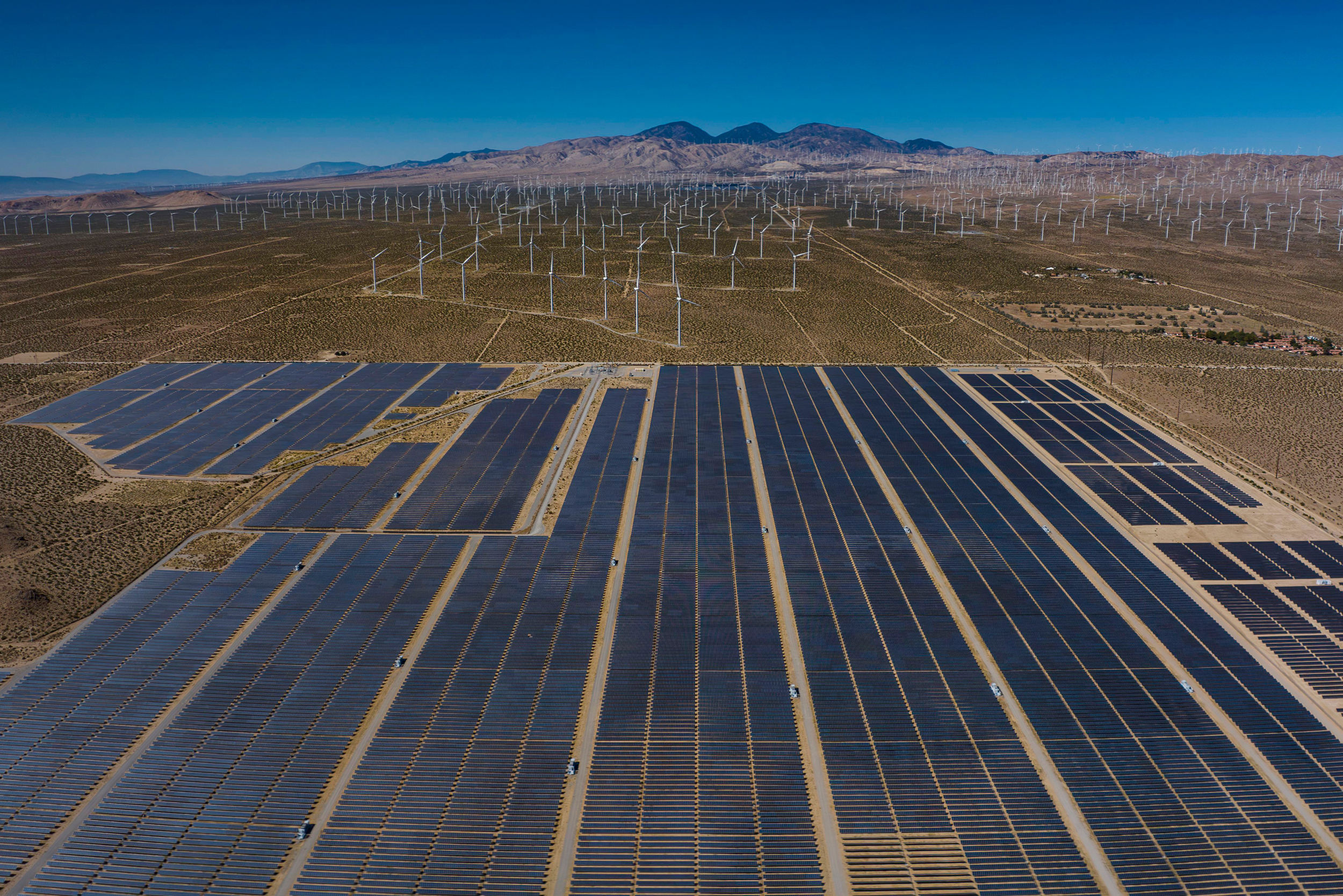 Wind turbines and solar panels merge in the desert of Mojave, Calif. Credit: Visions of America/Joe Sohm/Universal Images Group via Getty Images